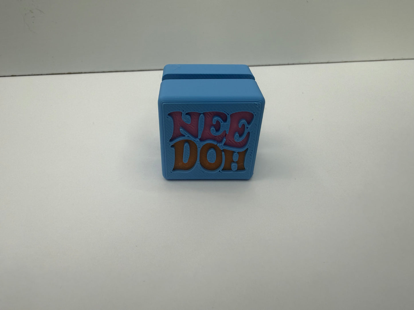 Needoh fidget clicker toy